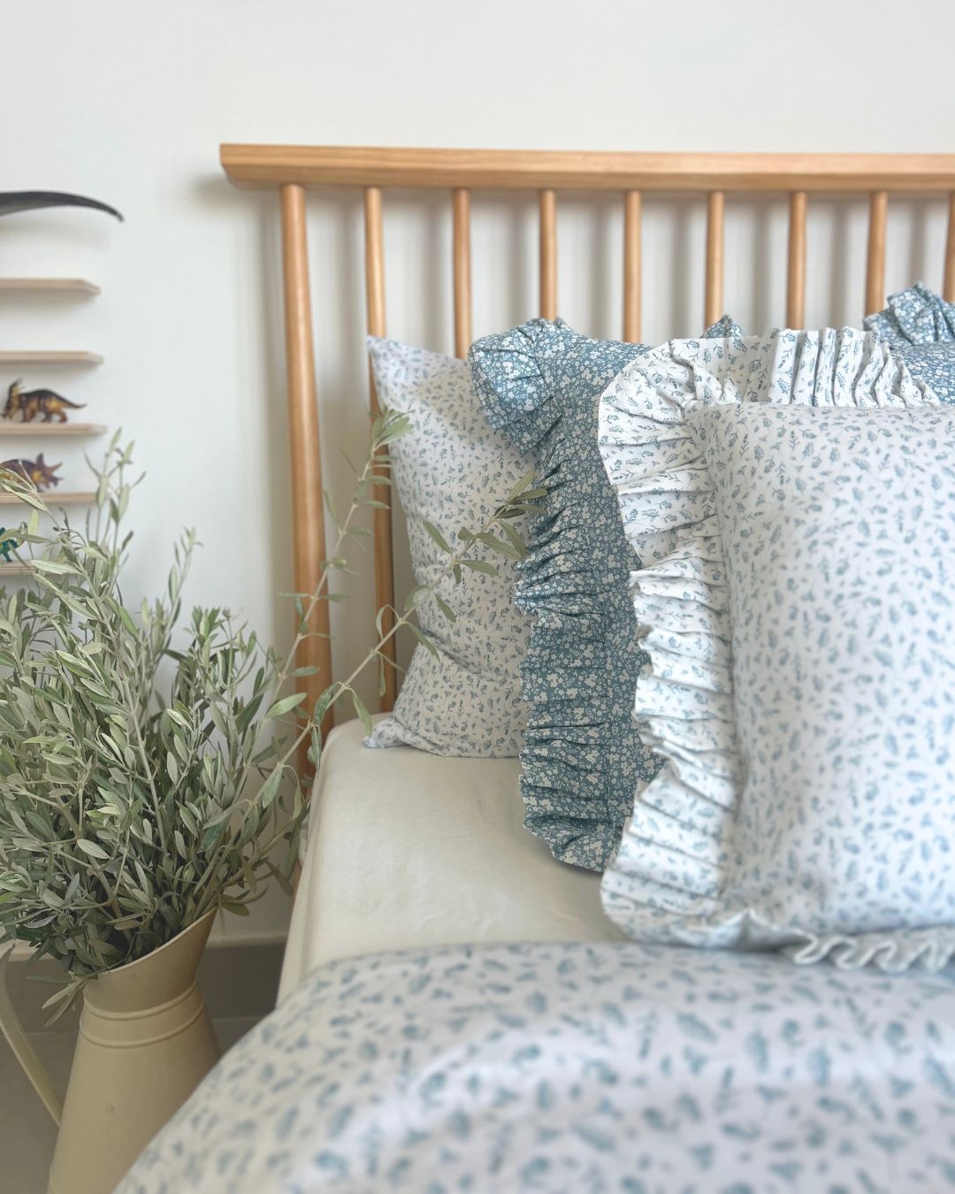 Blue floral frill cushion for nursery in Dubai