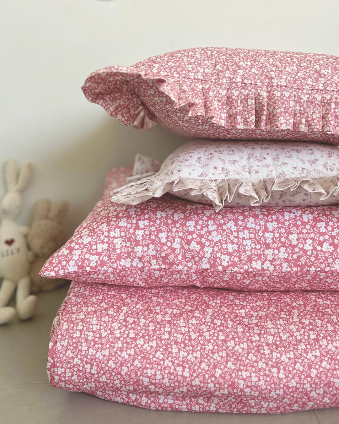 Vintage countryside-inspired pink bedding with reversible prints