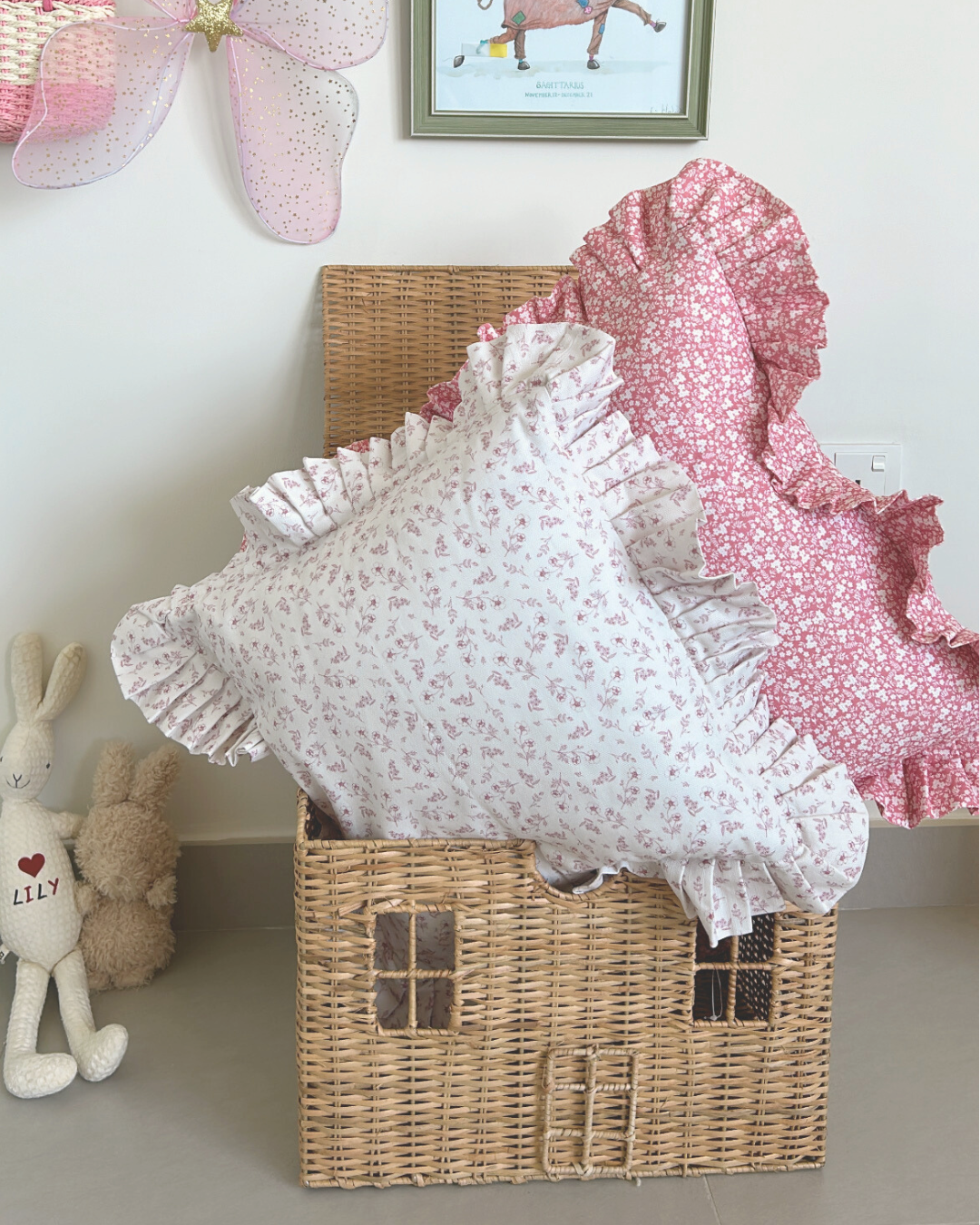 Vintage countryside-inspired pink cushion with frill edge