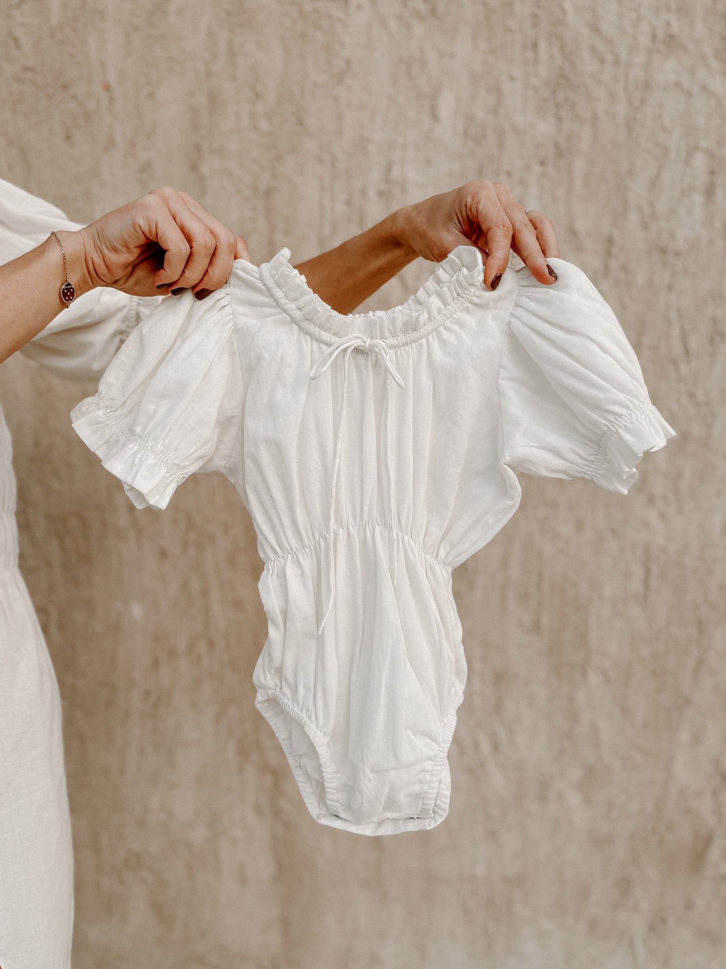 White puff sleeve baby romper Dubai